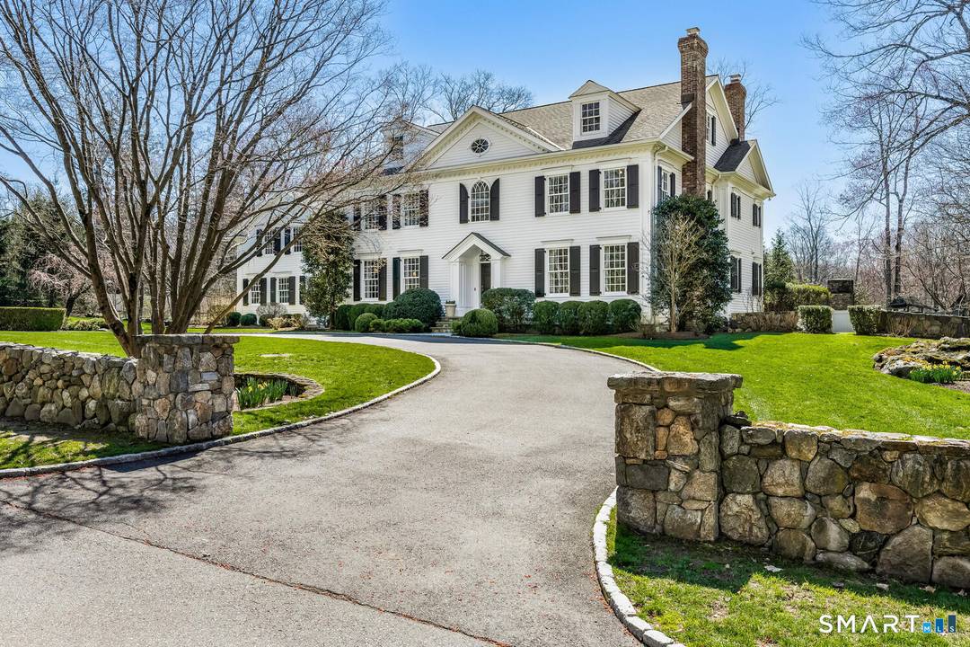 Set on nearly 2 private acres in coveted northern Darien, this exceptional custom Colonial offers refined living with timeless design and superior craftsmanship throughout.