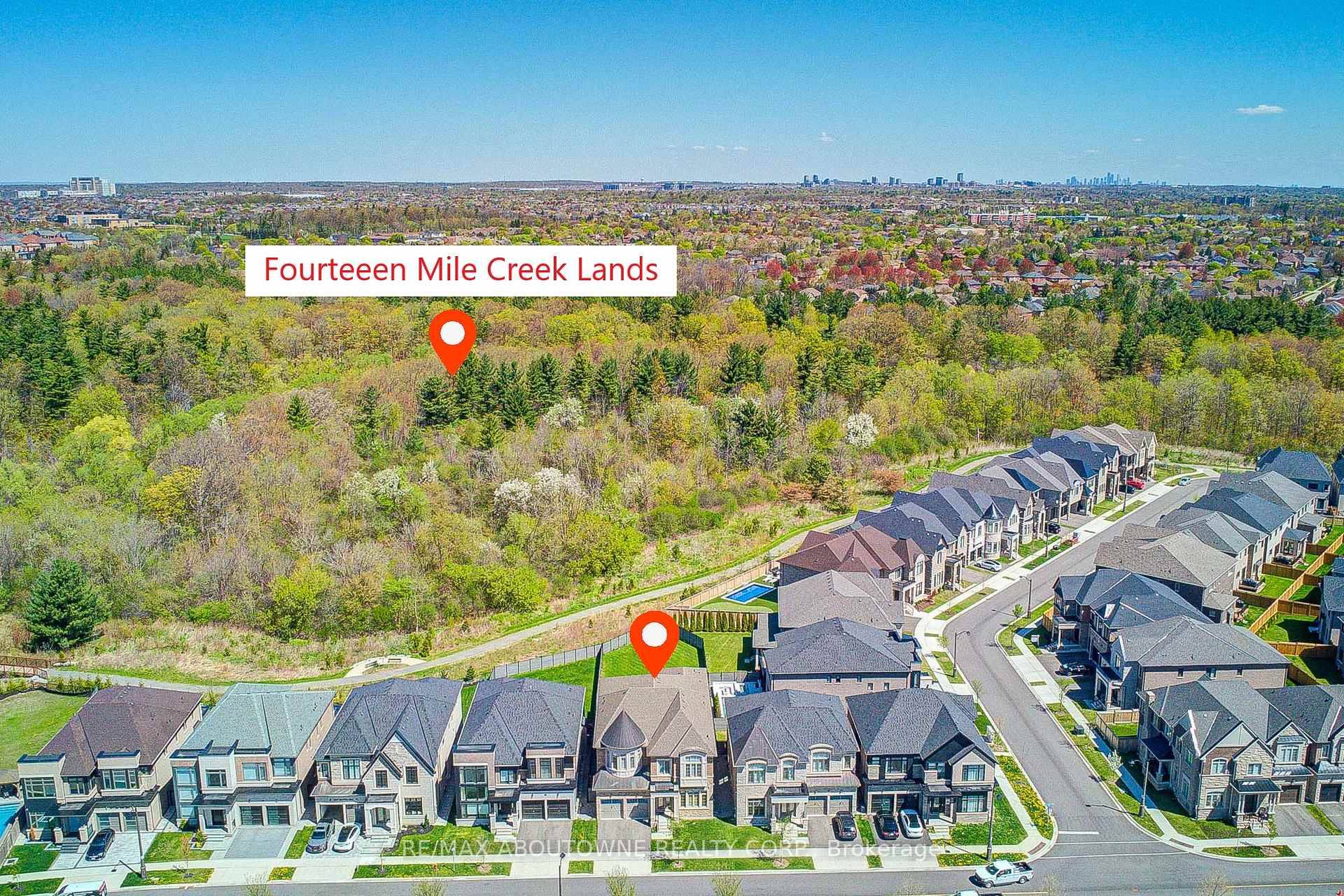 Experience exceptional luxury at the most precious lot in Glen Abbey, a custom designed estate backing onto the protected ravine of Fourteen Mile Creek Trails in Oakvilles most prestigious enclave.