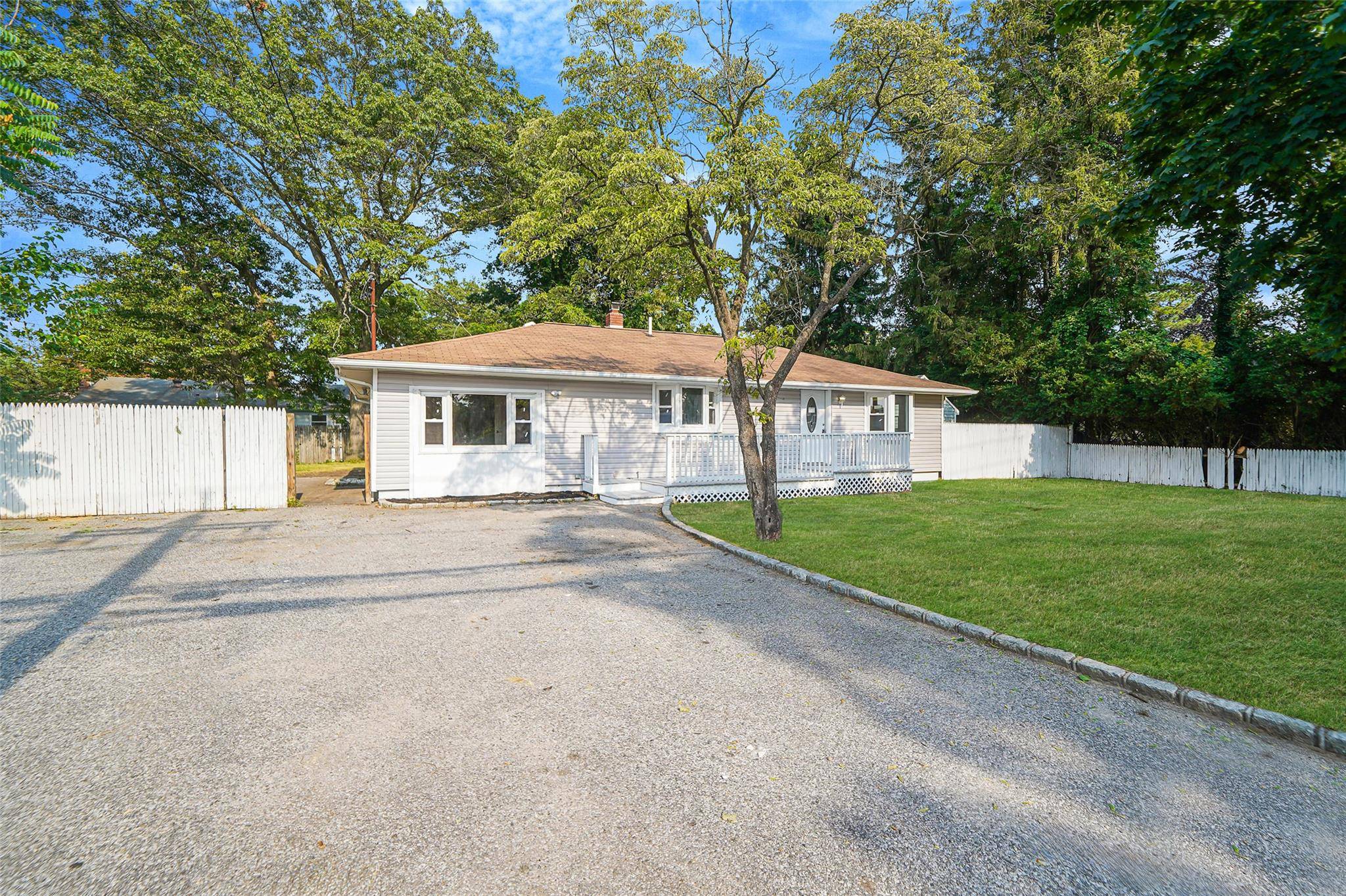 This charming, fully renovated ranch offers a bright and airy interior with a brand new exterior featuring updated siding and windows.
