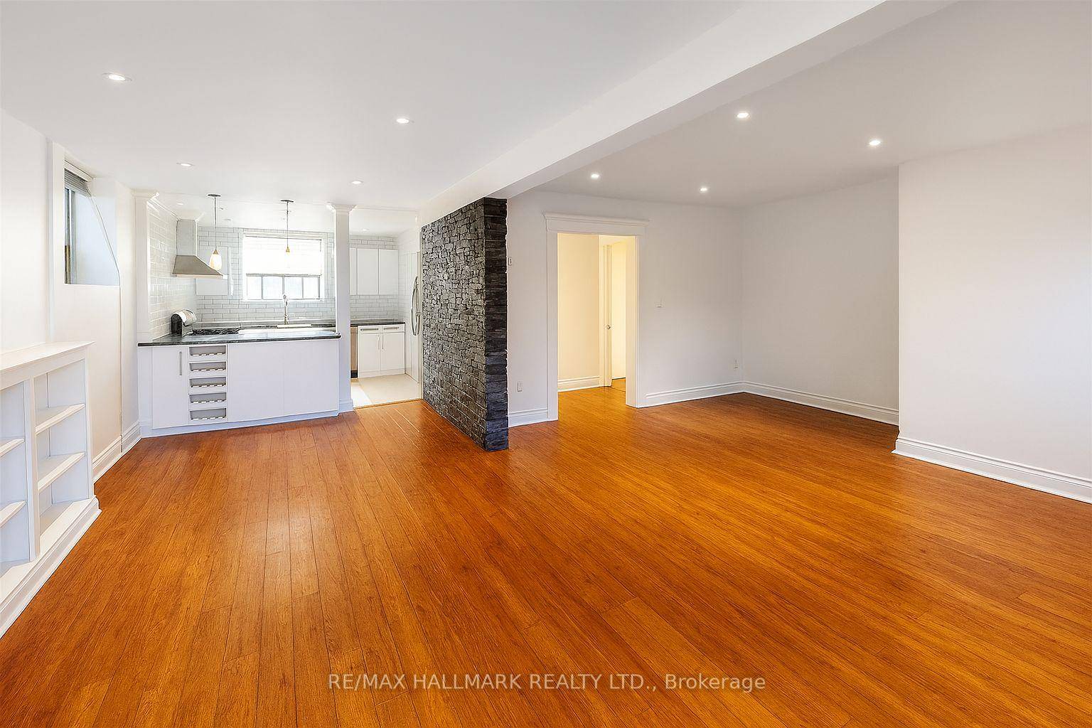 Discover a truly unique, very cozy and spacious chic urban loft style lower level apartment in a converted former monastery, perfectly positioned where trendy King West meets Roncesvalles Village !