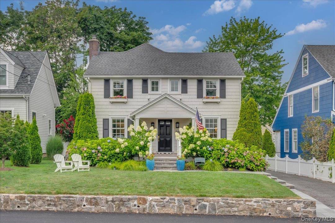 Experience the quintessential Larchmont lifestyle at 26 Kane Avenue, a picture perfect colonial that radiates curb appeal from the moment you arrive.