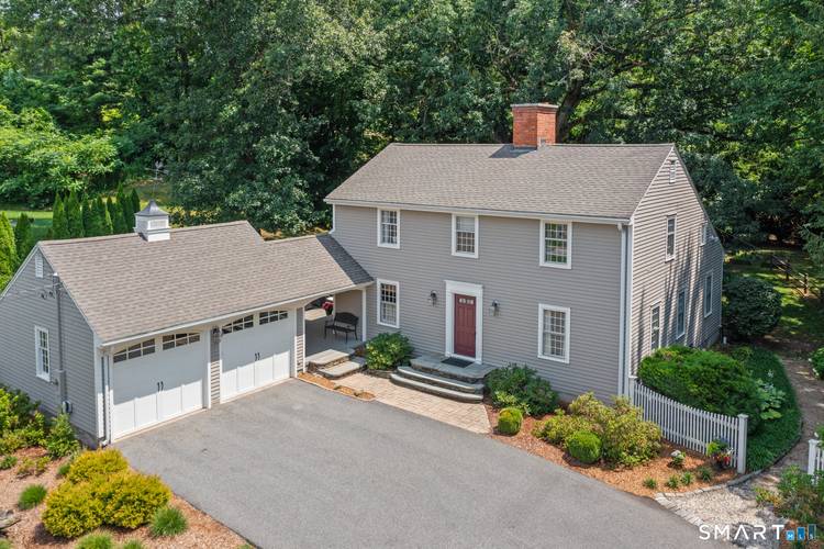 Exceptional curb appeal sets the stage for this always admired Glastonbury gem, beautifully positioned on a level, pastoral lot in the coveted Buttonball neighborhood.