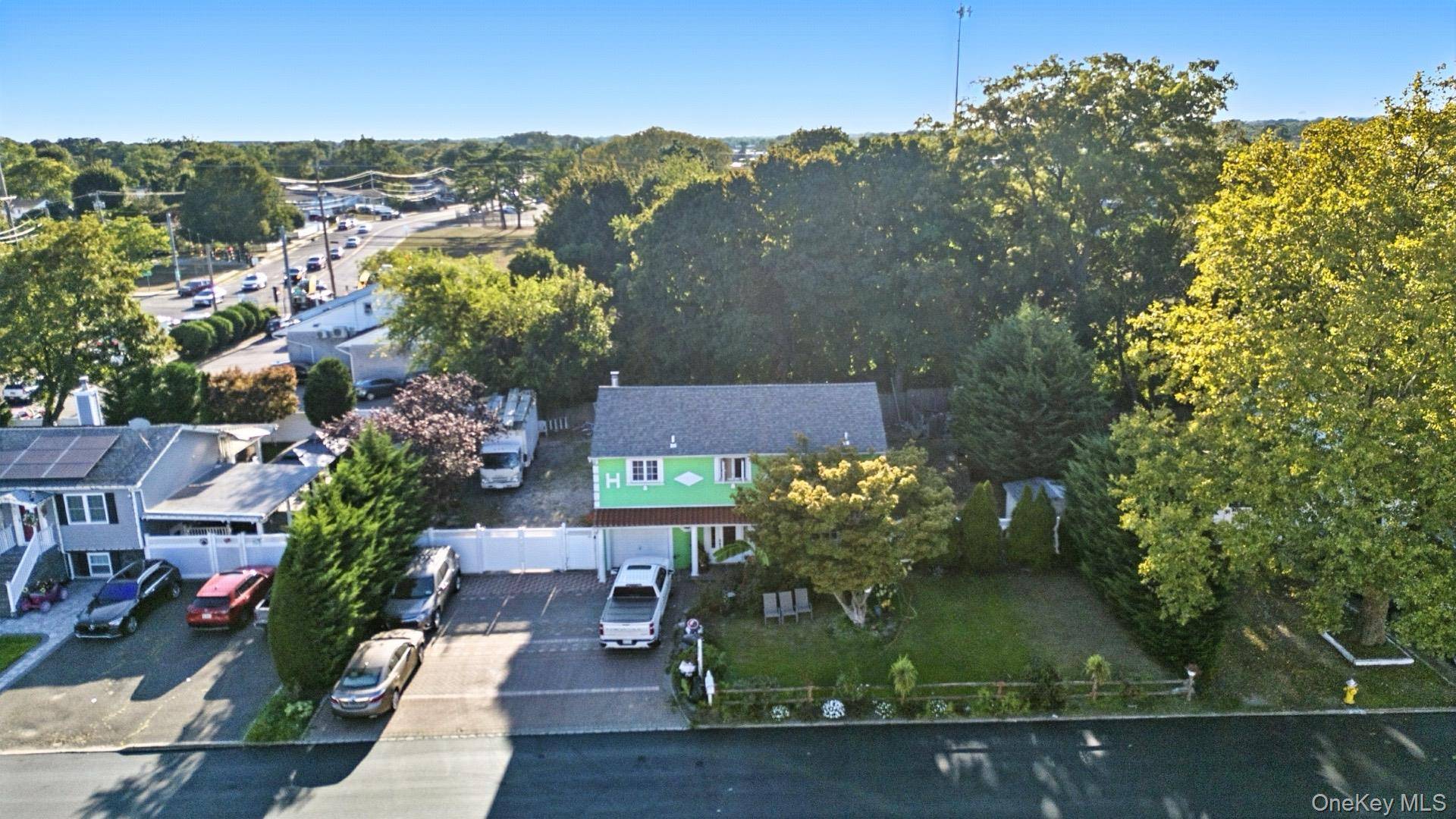 Welcome to 214 Tree Avenue, a spacious and beautifully maintained Splanch style home located in the heart of Central Islip !