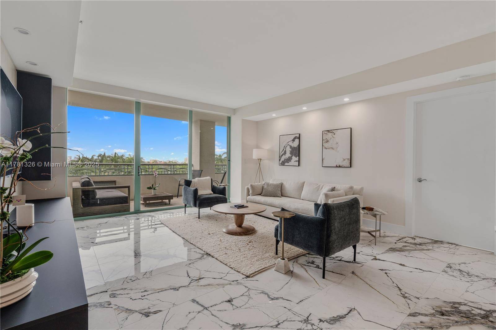 Welcome to Unit 605 at the Ritz Carlton Residences in Coconut Grove, a recently renovated, fully furnished, 2 bedroom and 2.