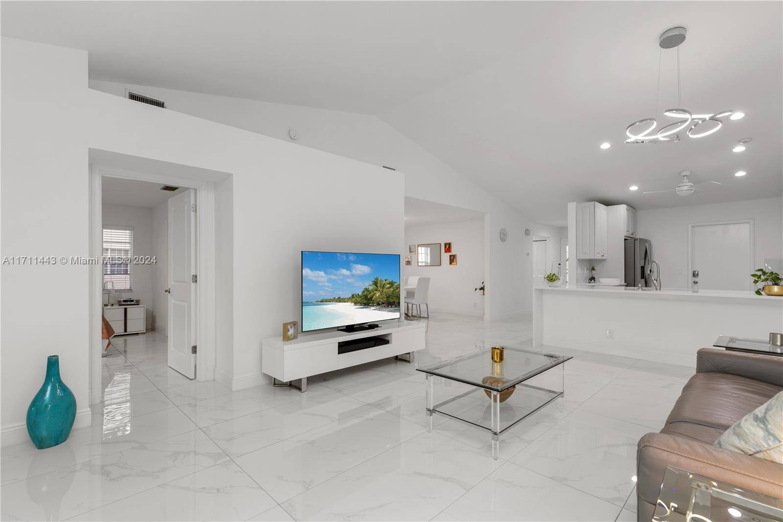 JUST REDUCED ! Stunning 55 2 Bed 2 Bath villa on the lake with one car garage !