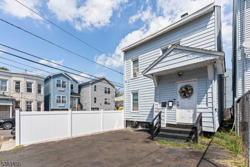 Great 2 Family Home Recently Renovated with Very Low Taxes.