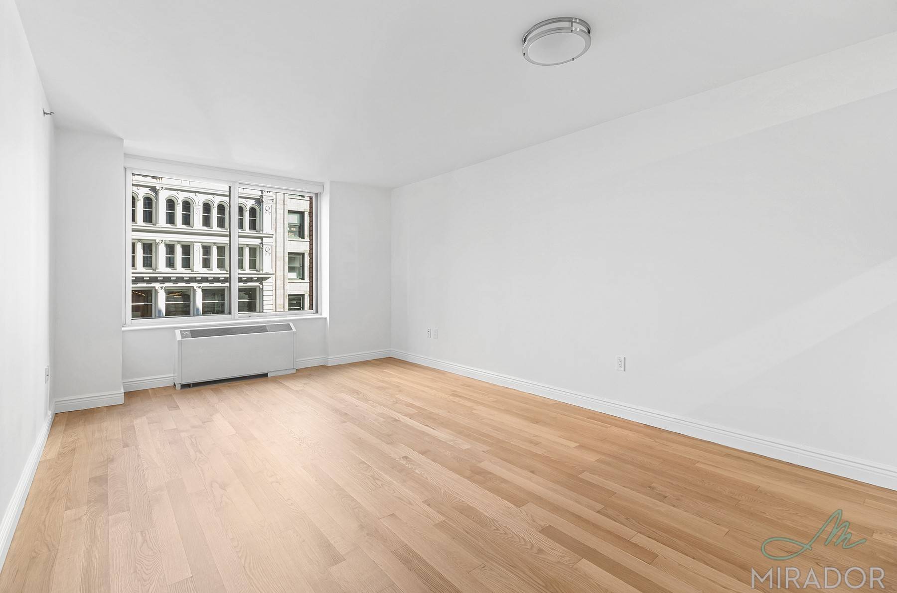 One bedroom with gorgeous whitewash strip hardwood floors, stainless steel appliances, and marble bath now available.