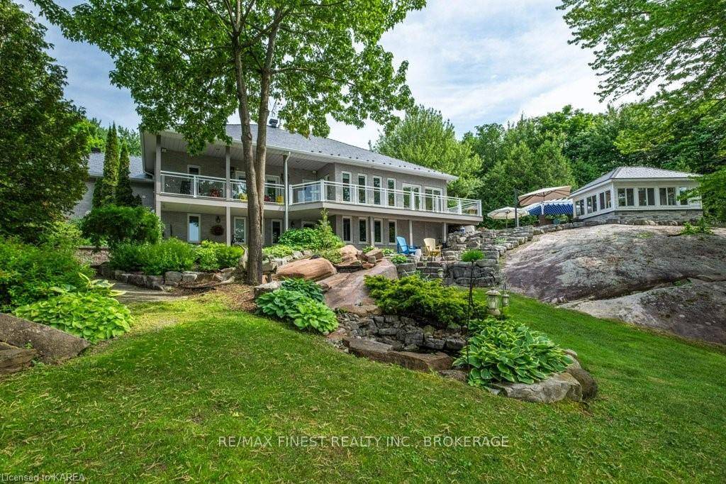 Welcome to 3909 Stone Point Rd, Inverary, Ontario a Garofalo built masterpiece on the pristine shores of Dog Lake, nestled on over two acres of pure tranquility.