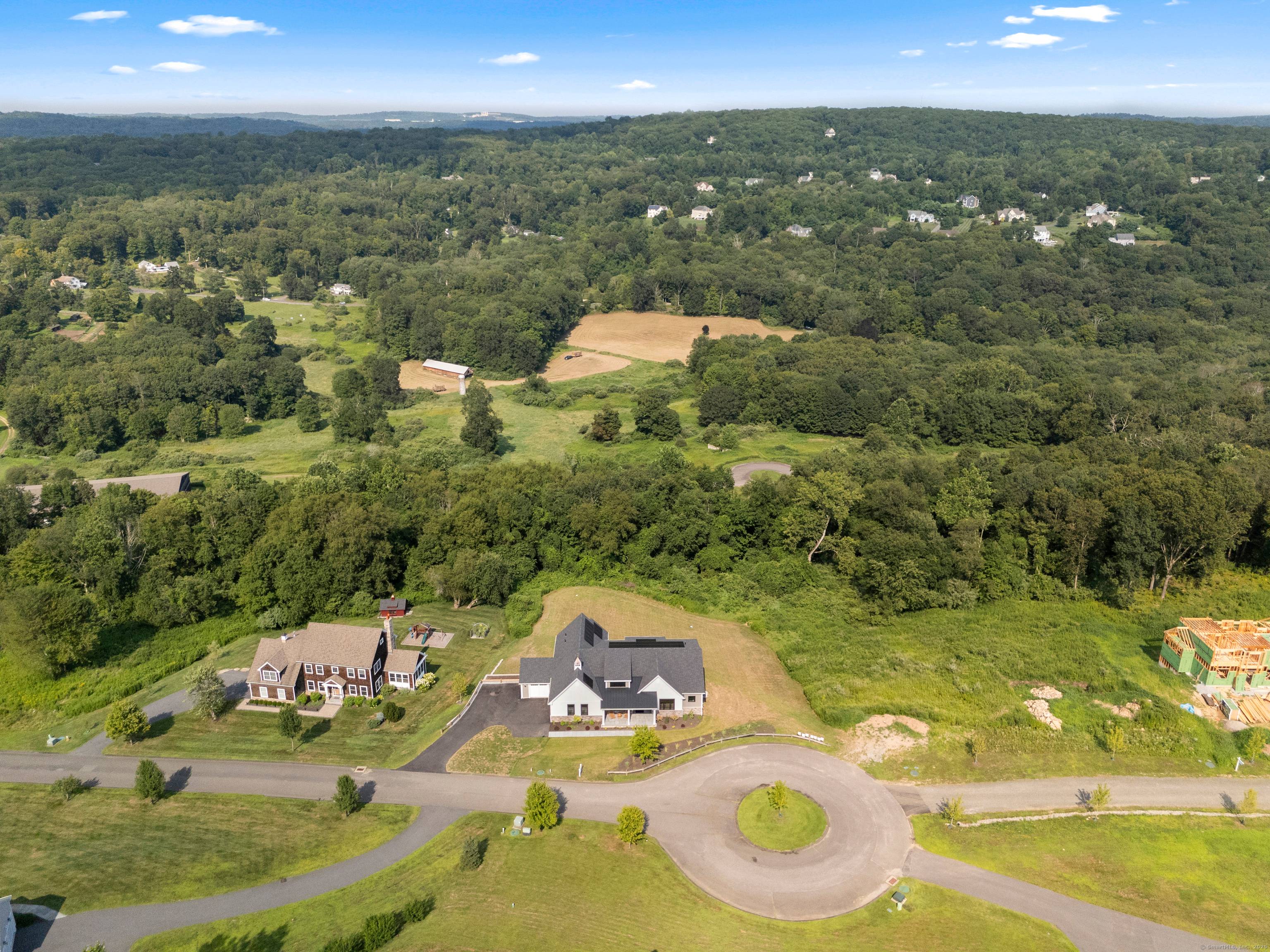 Welcome to luxury living in this stunning Modern Farmhouse Ranch, perfectly situated adjacent to Willow Creek Equestrian Farm.