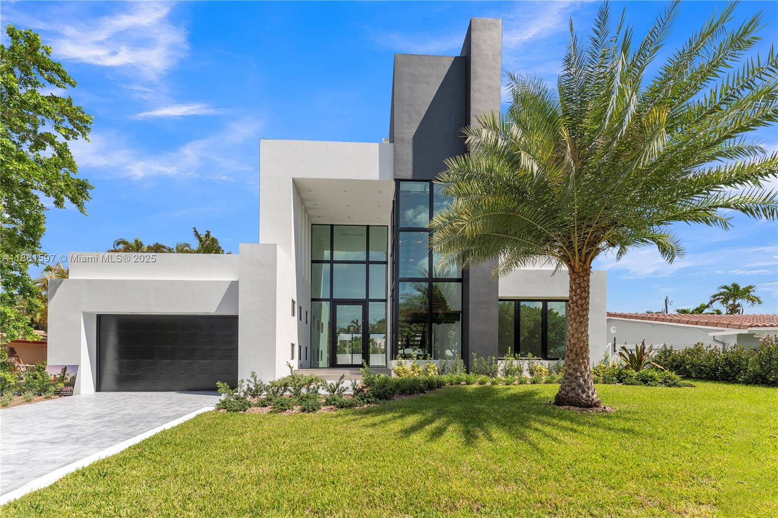 Step into modern elegance with this newly built Pompano Beach home, designed for today s lifestyle.