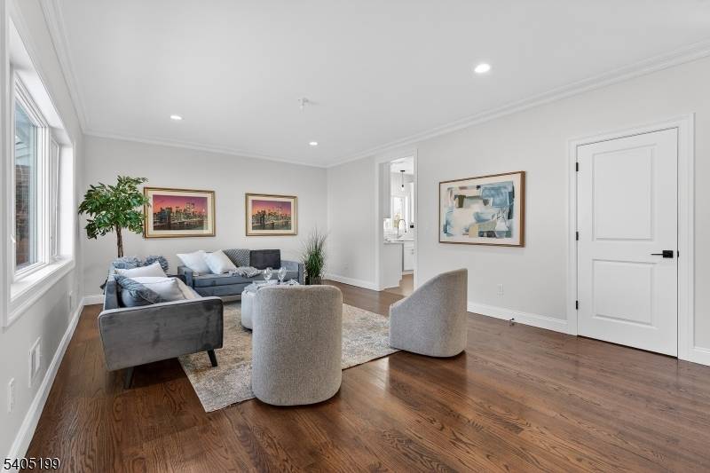 Welcome to this stunning Fair Lawn side hall Colonial completely gutted, expanded, and rebuilt to feel like brand new construction.