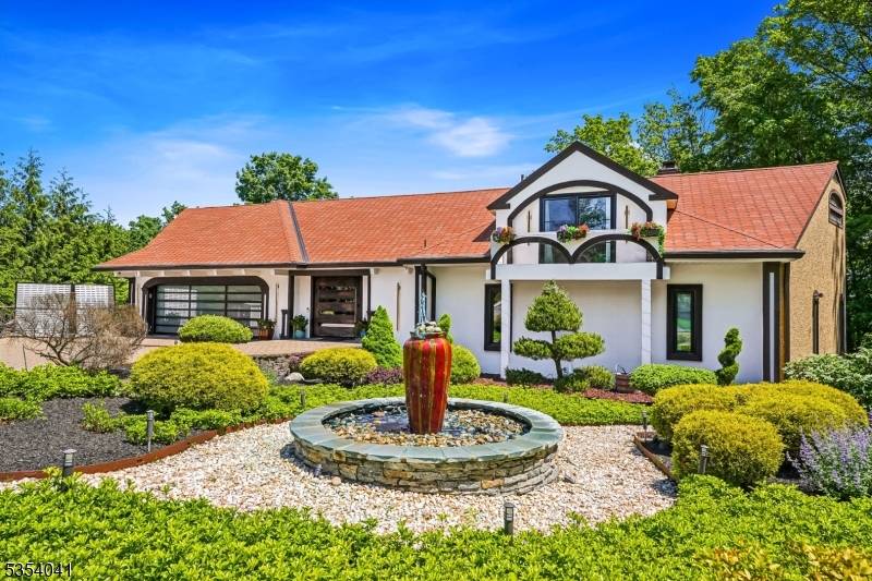 STUNNING SPANISH VILLA STYLE ESTATE MILLION DOLLAR SKYLINE VIEWS PRIVATE OASIS SPA RETREAT at the end of a private cul de sac, this fully renovated Spanish villa style showpiece offers ...