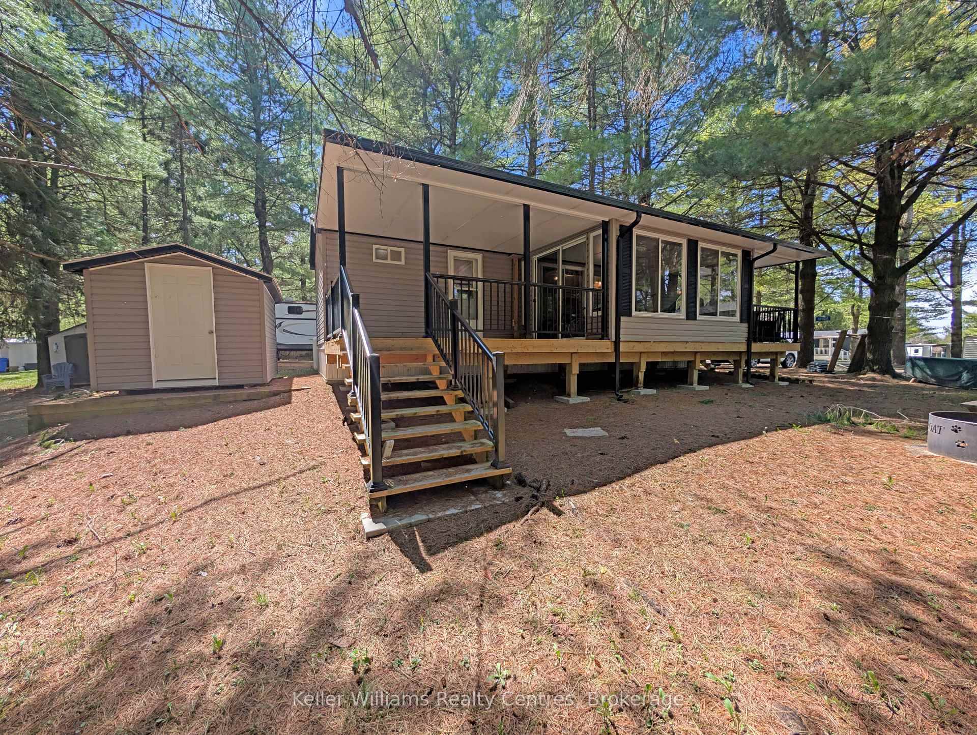 Escape to serenity at Fishermans Cove Seasonal Resort with this charming 2018 park model, nestled in the tranquil pines.