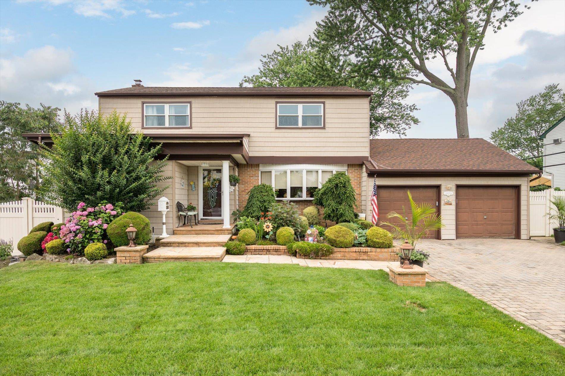 Welcome to this beautifully maintained, rare 5 Bedroom 2.