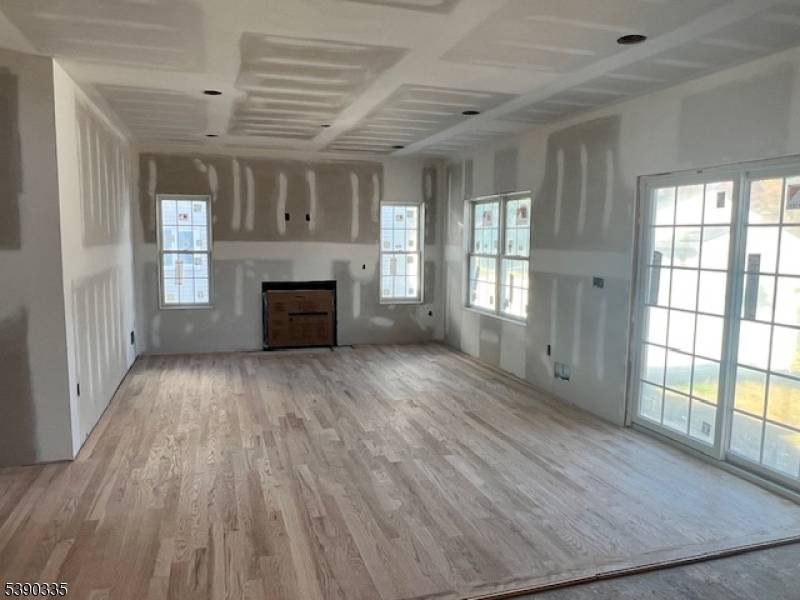 The new construction with quality material by COSMO Builders features a spacious colonial with 5 beds, 4.