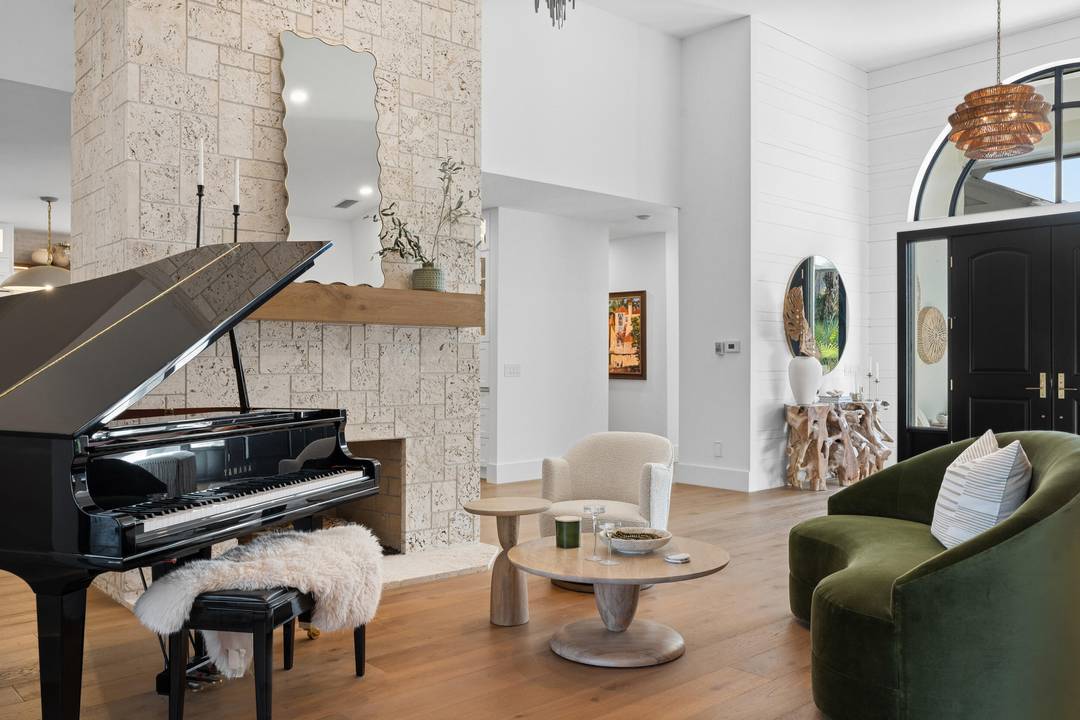 Welcome to an extraordinary custom designed estate nestled within the gates of Pipers Landing Yacht amp ; Country Club.