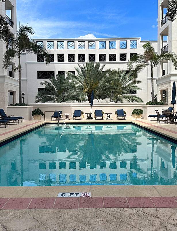 Beautiful 1 bedroom 1 bath with open floor plan overlooking the pool and deck, Kitchen with granite counter tops in unit washer and dryer.