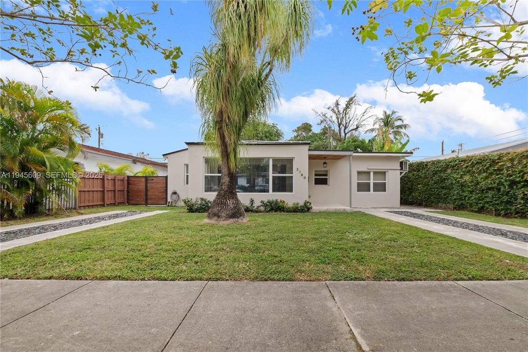 Fully renovated residence featuring a new metal roof and flat roof with high end finishes throughout.
