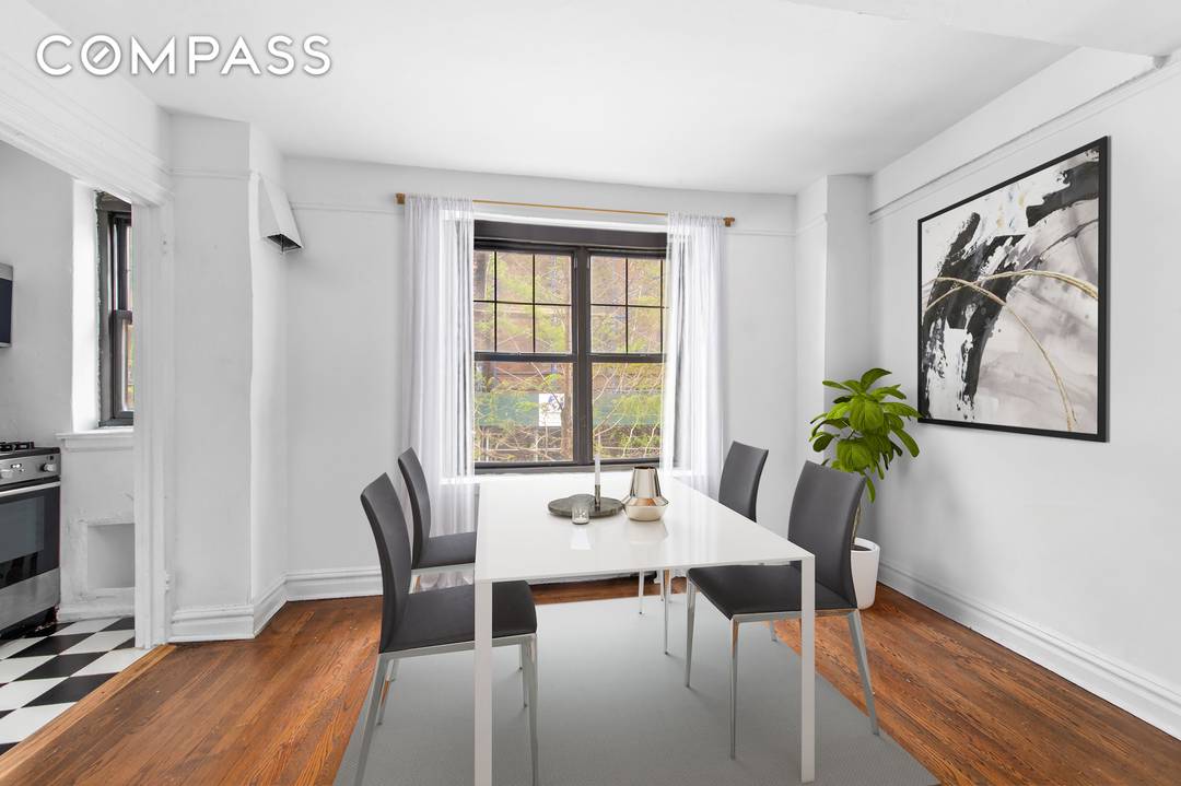 This adorable residence 2A is a one bedroom with tons of character and pretty views onto a church and beautiful greenery.