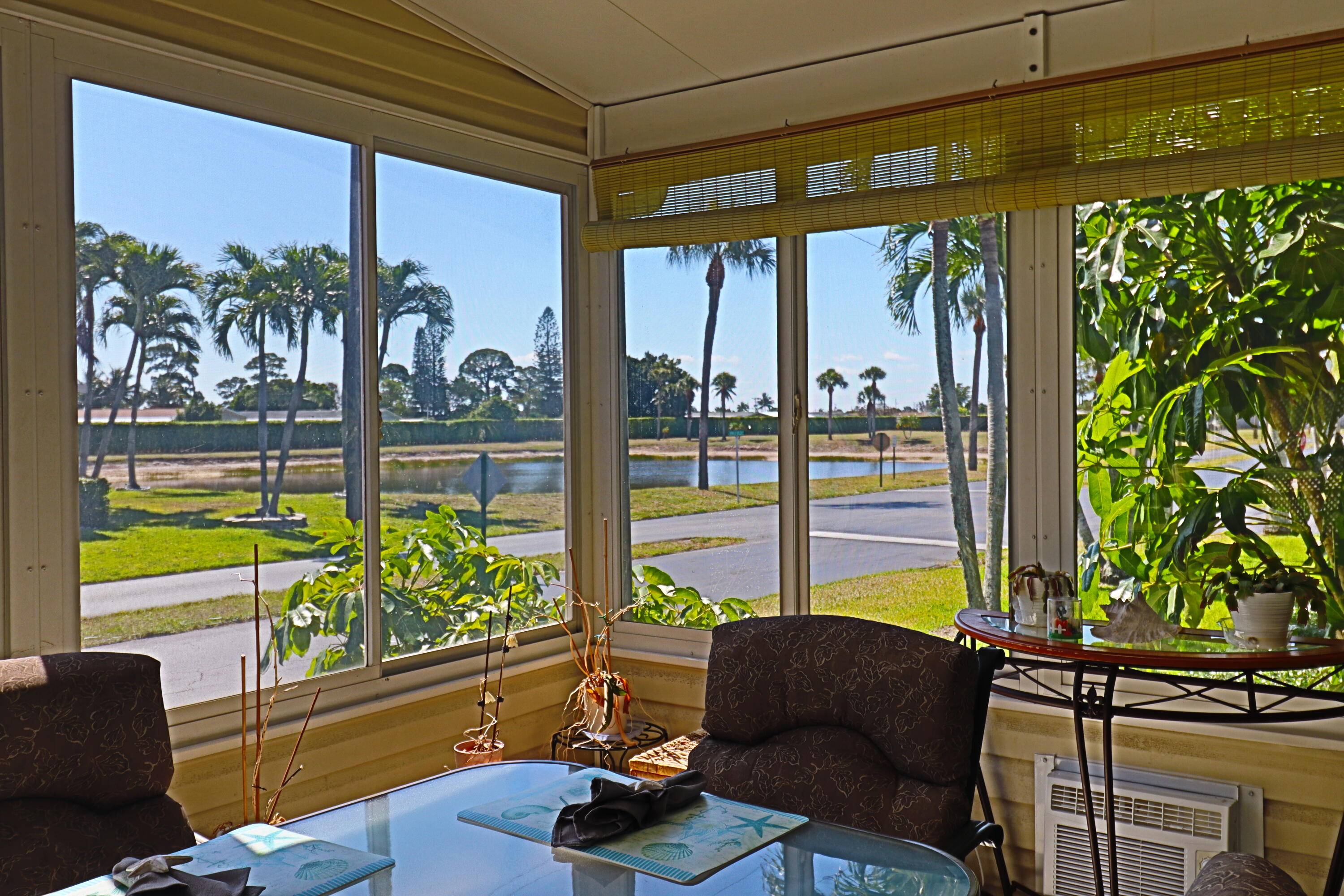 Beautiful Sunrises with a Lake View from this 240 sq ft Florida Room, with A C, windows and screens.