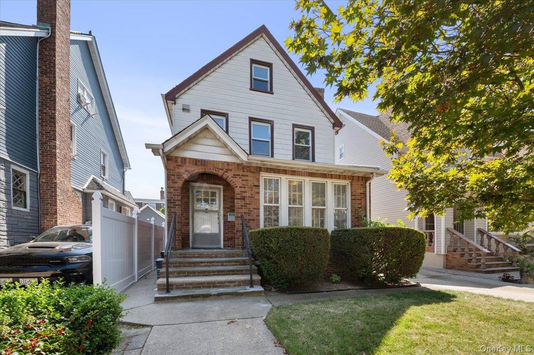 Legal two family detached home with private driveway and detached garage, offered in as is condition.