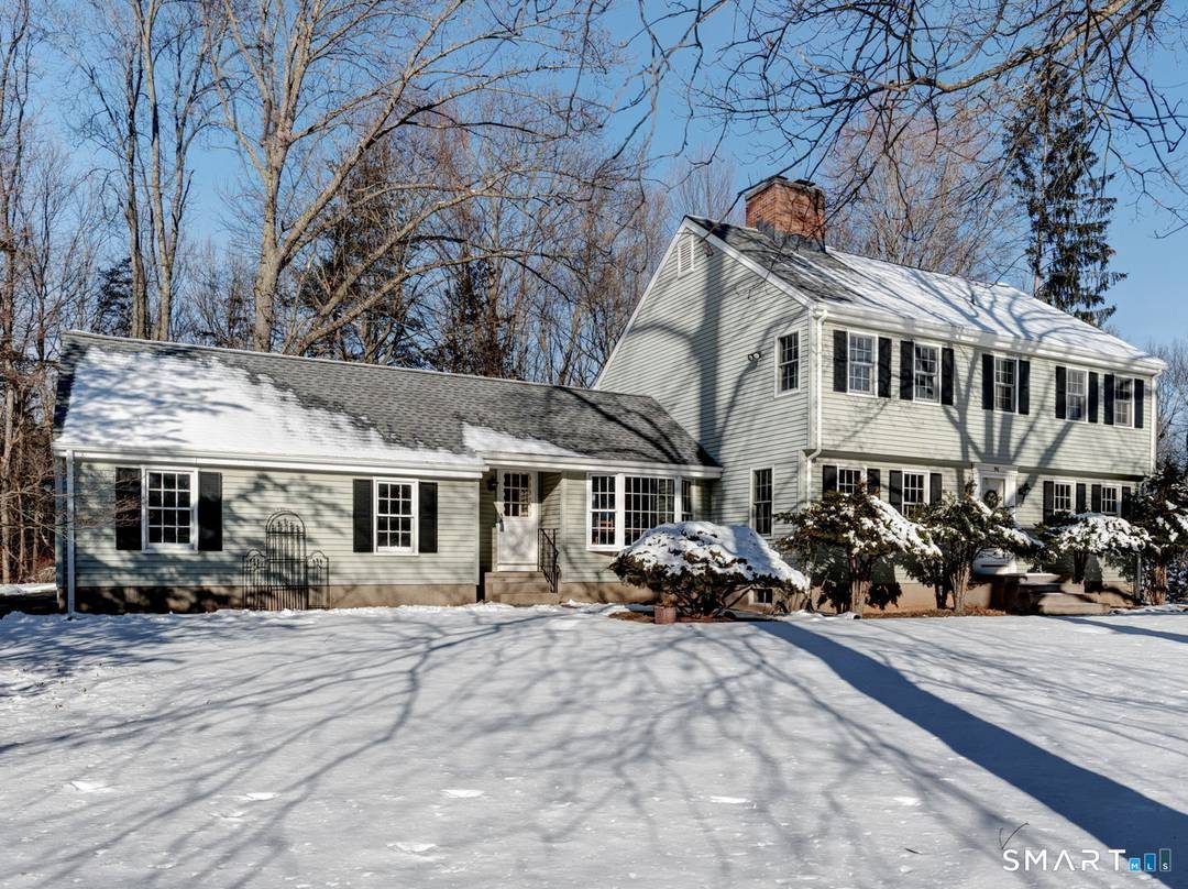 From morning sunlight in the front to back living room to cozy evenings by the wood burning fireplace in the family room accented with stylish wood beams and panels, this ...