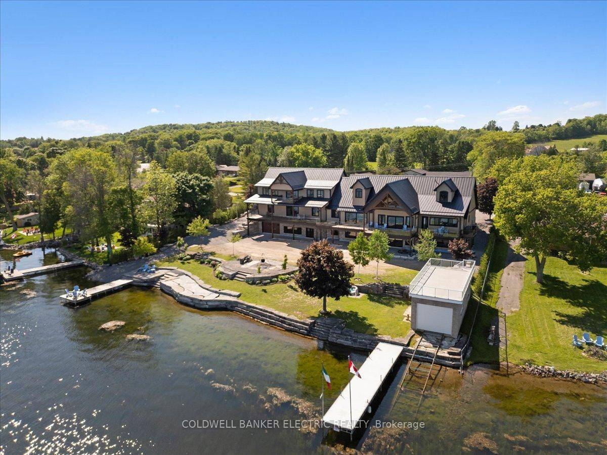 INTRODUCING AN UNPARALLELED WATERFRONT RESIDENCE That Sets A New Standard In Luxury Living !