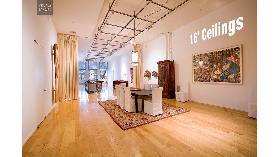 This magnificent loft, situated at 519 Broadway in SoHo, embodies urban elegance.