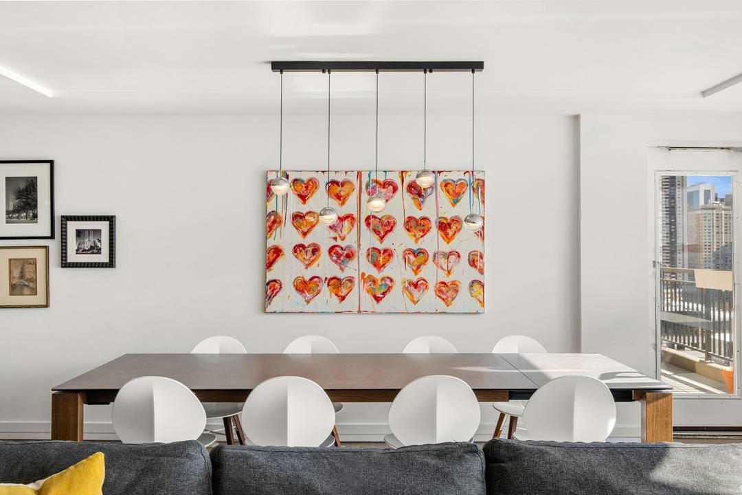 New to market and rarely available, this high floor three bedroom, two bath home is flooded with light and offers open city views with partial river views.