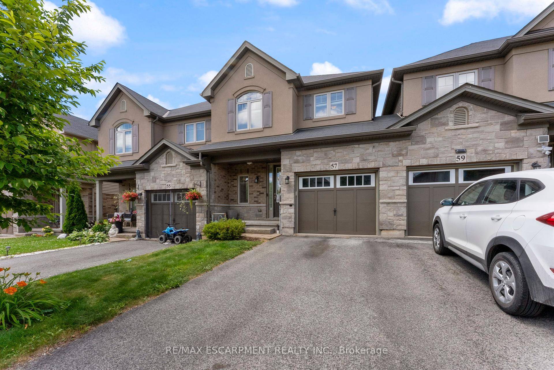 Welcome to 57 Sexton Crescent, a beautifully maintained townhome nestled in one of Ancaster's most desirable family friendly neighbourhoods.