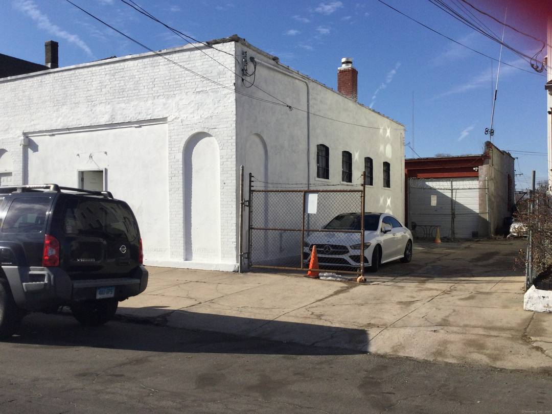 Industrial building, It Has been used like storage, Two separated Buildings in One, The front Building it is all Finish like offices and finish Basement, with two full Baths, One ...