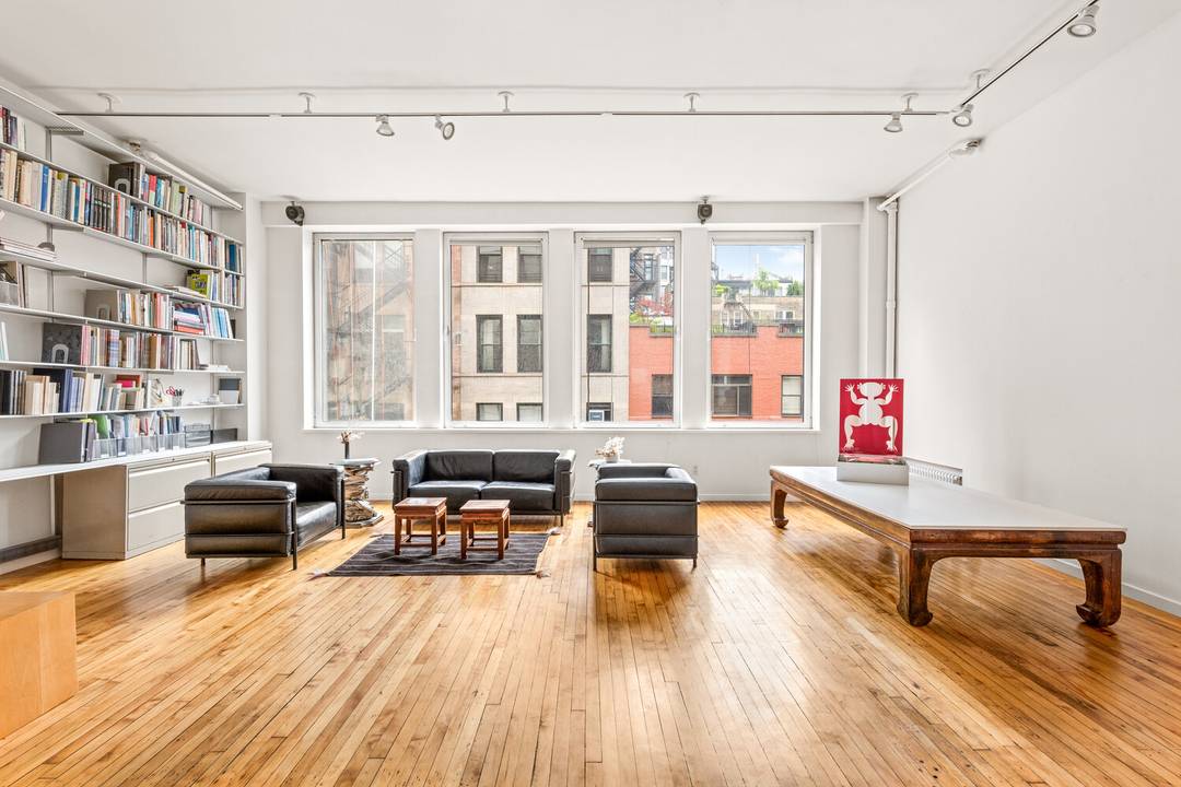 Located in the heart of Greenwich Village, this generous 2 bedroom, 2 bath loft offers a unique blend of historic charm and modern comfort.