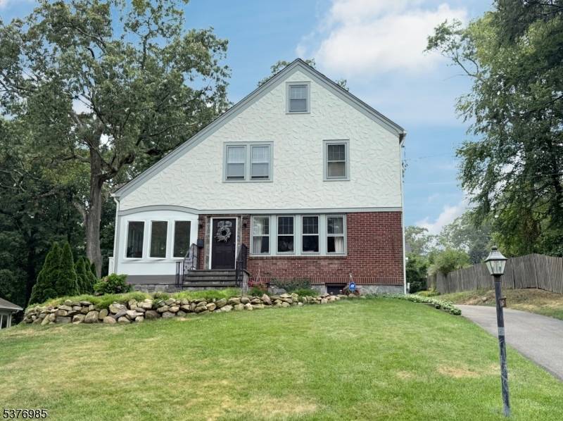 Park Section Stunner ! This beautifully redesigned and transformed 4 BR, 3.