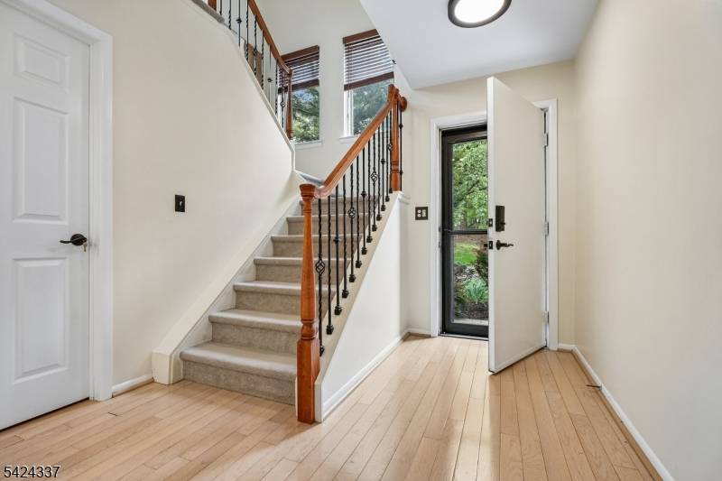 This beautifully updated and meticulously maintained end unit offers a refined townhome experience in one of Essex County's most sought after school districts.