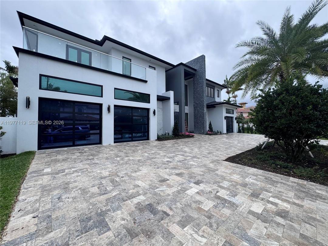 Unparalleled luxury in the prestigious heart of Coral Ridge.