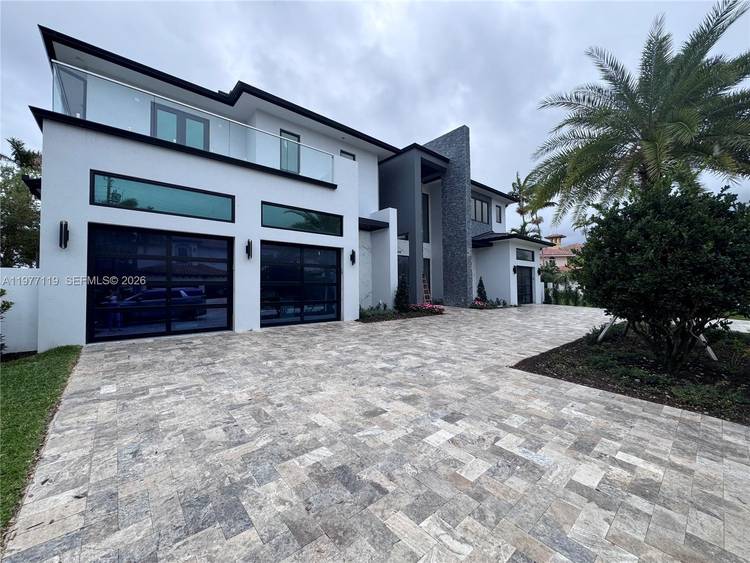 Unparalleled luxury in the prestigious heart of Coral Ridge.