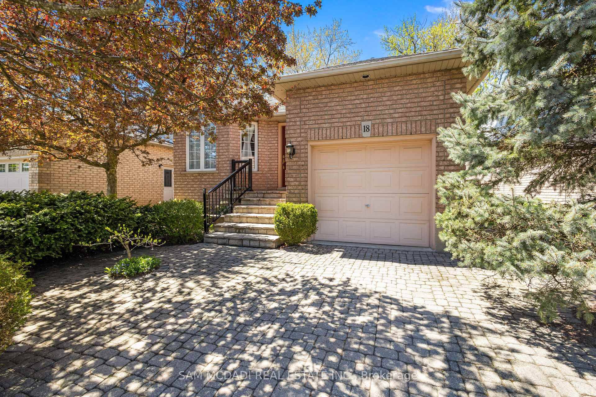 Welcome to 18 Naples Boulevard, a warm and versatile residence nestled in Hamilton's family friendly Barnstown community.