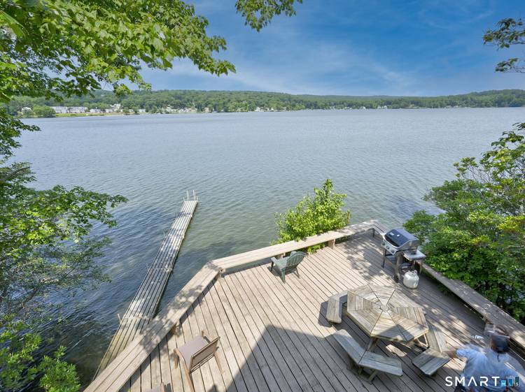 A Seasonal rental 2027 Whisk off to your own private Green Mountain Chalet nestled on the shores of a quiet Connecticut lake !