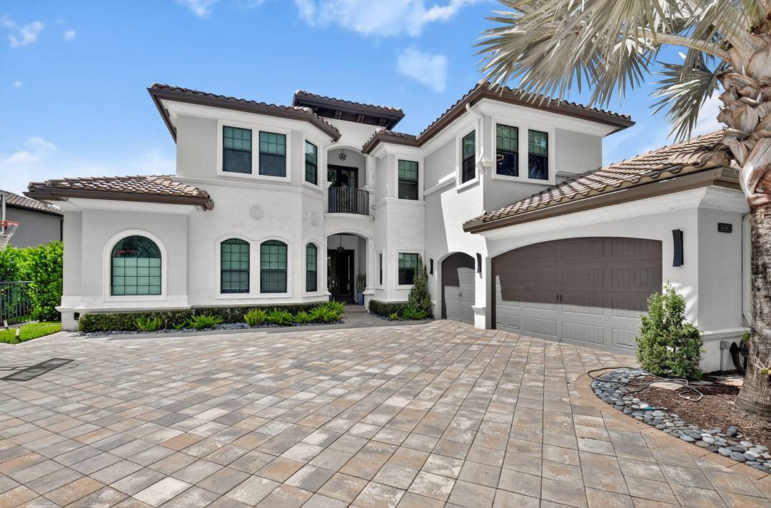 Stunning Two Story Lakefront Estate with Pool Luxury Upgrades.