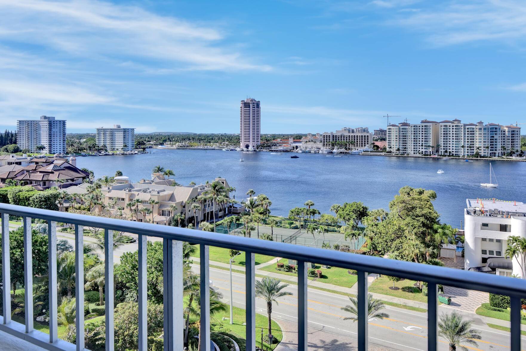 Waterfront two bedroom, two bathroom residence, offering spectacular views of Lake Boca, the city, and breathtaking sunsets.
