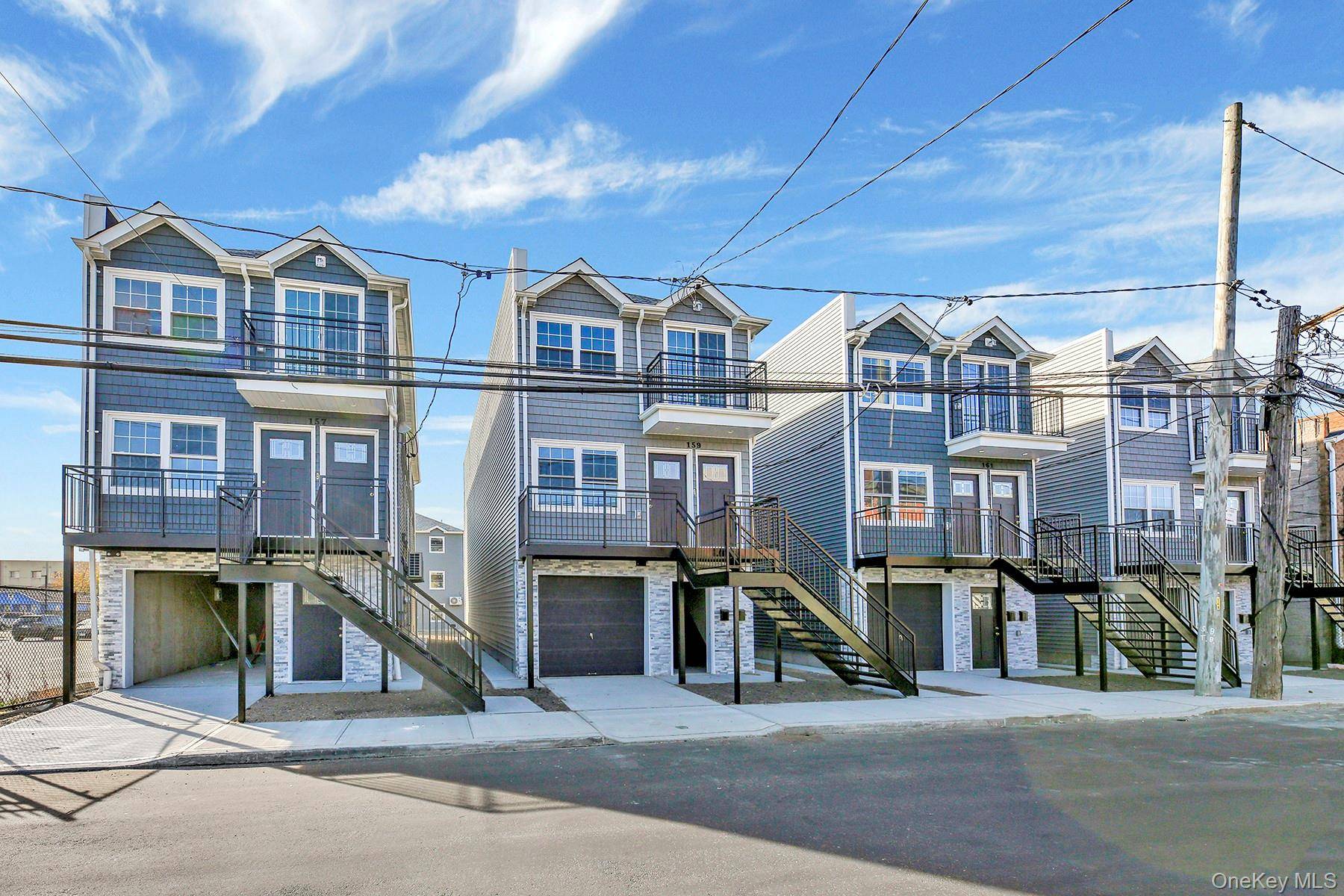 163 Beach 25 Street is a custom built BRAND NEW CONSTRUCTION two family nestled on a beautiful tree lined street of Far Rockaway with ocean views and stones throw to ...