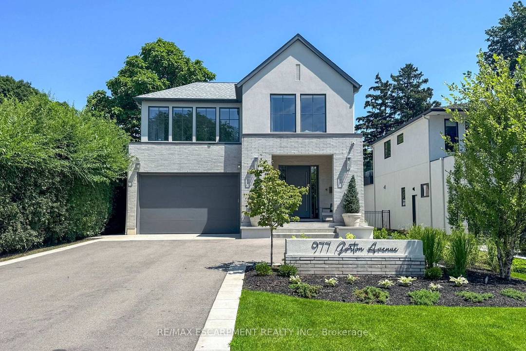 This stunning 2022 custom built home sits on a deep 50 x 198 ft lot in Burlington's coveted Aldershot South, offering 4, 700 sq.