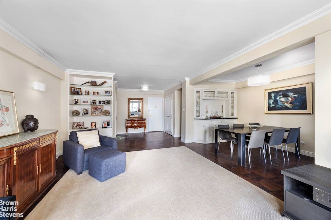 On a high floor with light pouring into every room this spacious 2BR 2BTH home has an oversized living room, huge dining area, washer dryer and marvelous built ins throughout.