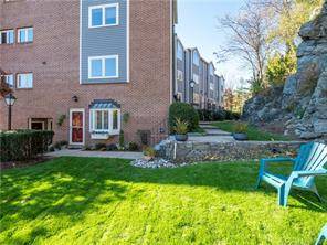 Beautifully renovated two level townhouse in private setting in desirable Silvermine community.