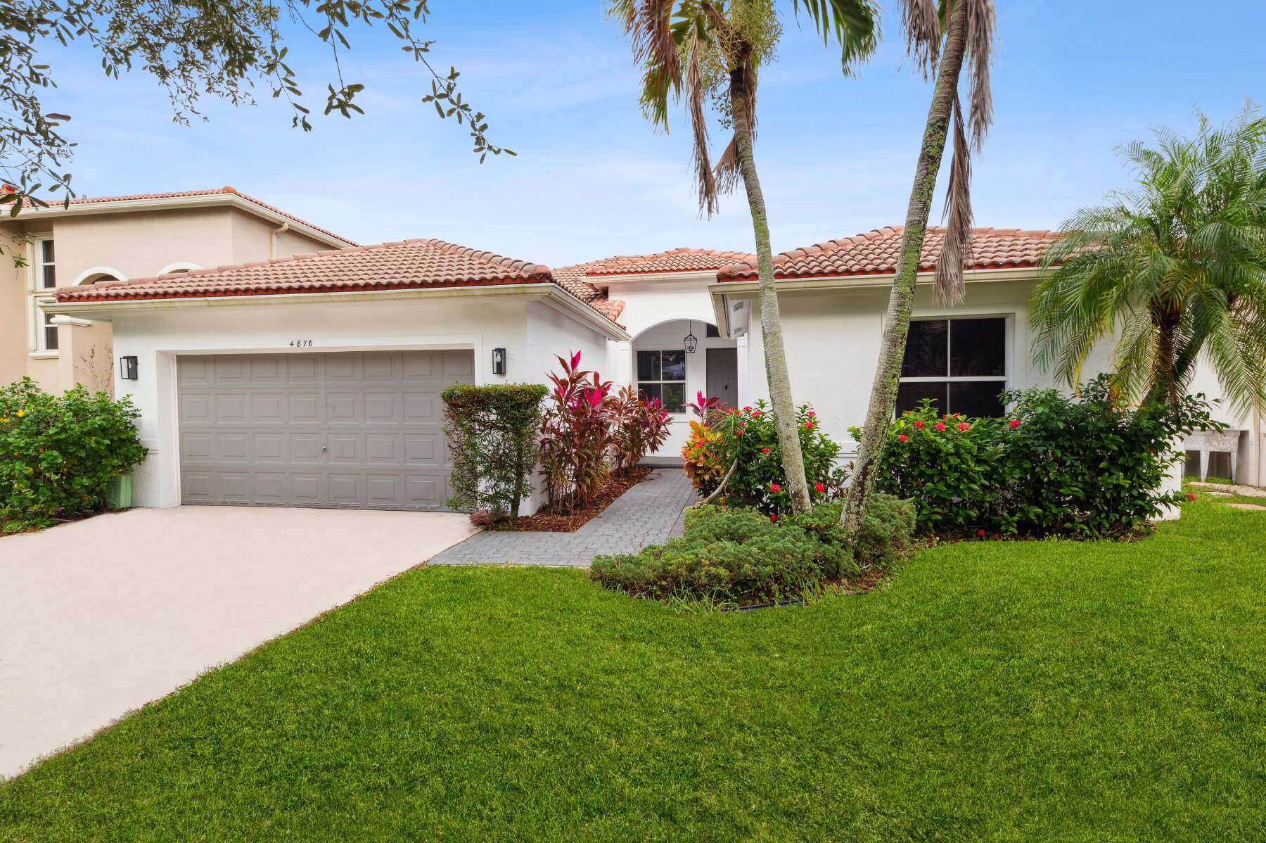 Welcome to this stunning newly renovated single family home in the highly sought after gated community of Indigo Lakes.