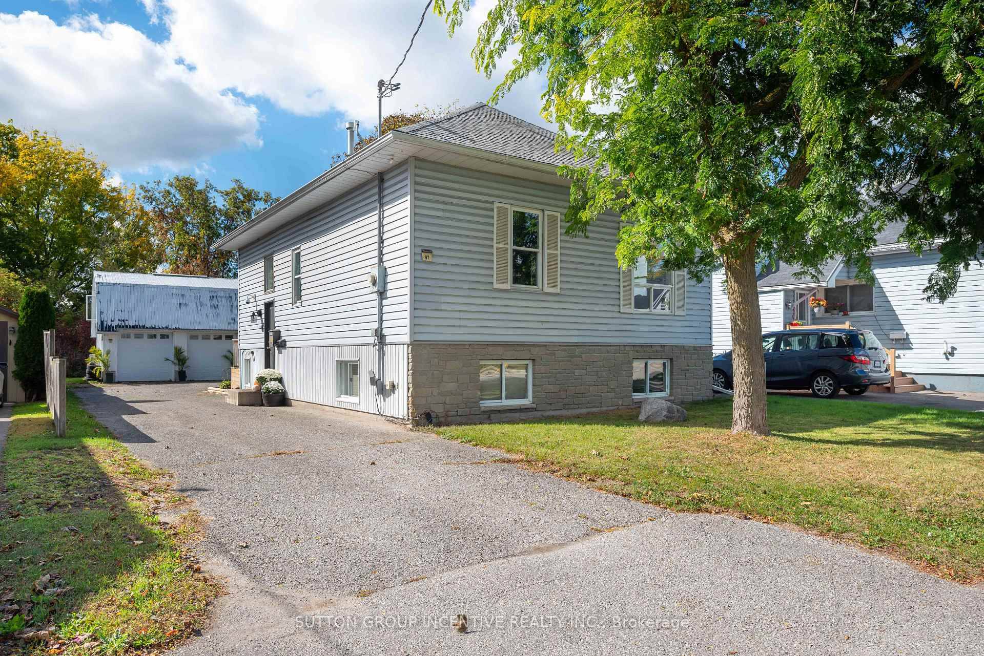 Completely Renovated 2 1 Bedroom Bungalow over 1800sq ft finished with Two Storey Shop and In law Apartment.