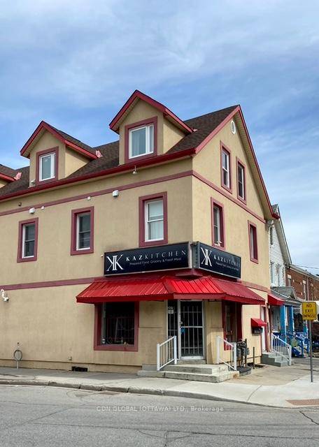Retail space available for lease on the ground floor in the North end of the Byward Market at 207 Guigues Avenue, with residential apartments above.