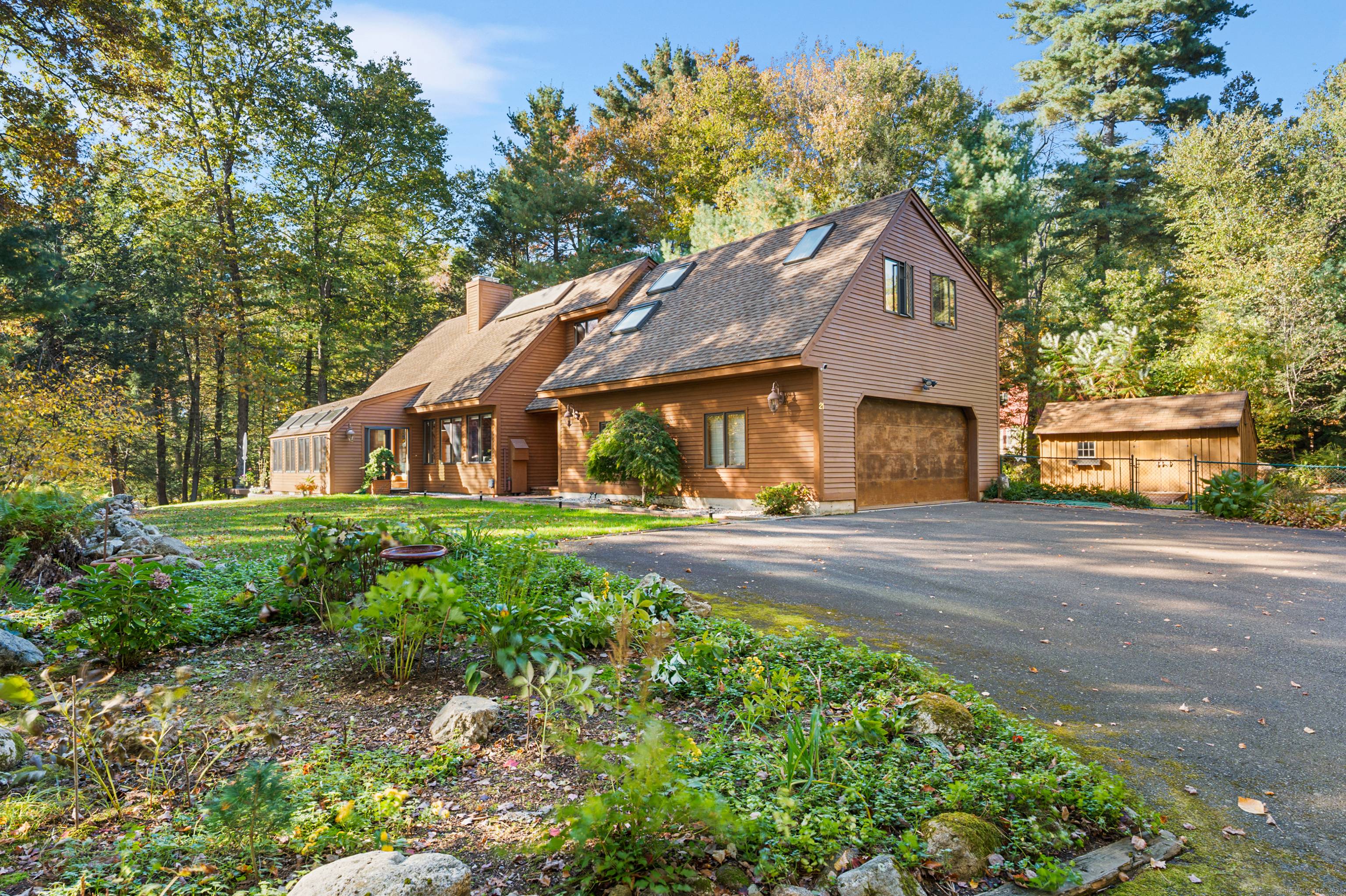 NOT YOUR STANDARD COOKIE CUTTER HOME THIS SOLIDLY BUILT RETREAT FEATURES SOARING WOOD CATHEDRAL CEILINGS AND DRAMATIC HEAVY BEAMS THAT MAKE A STATEMENT THE MOMENT YOU ENTER.