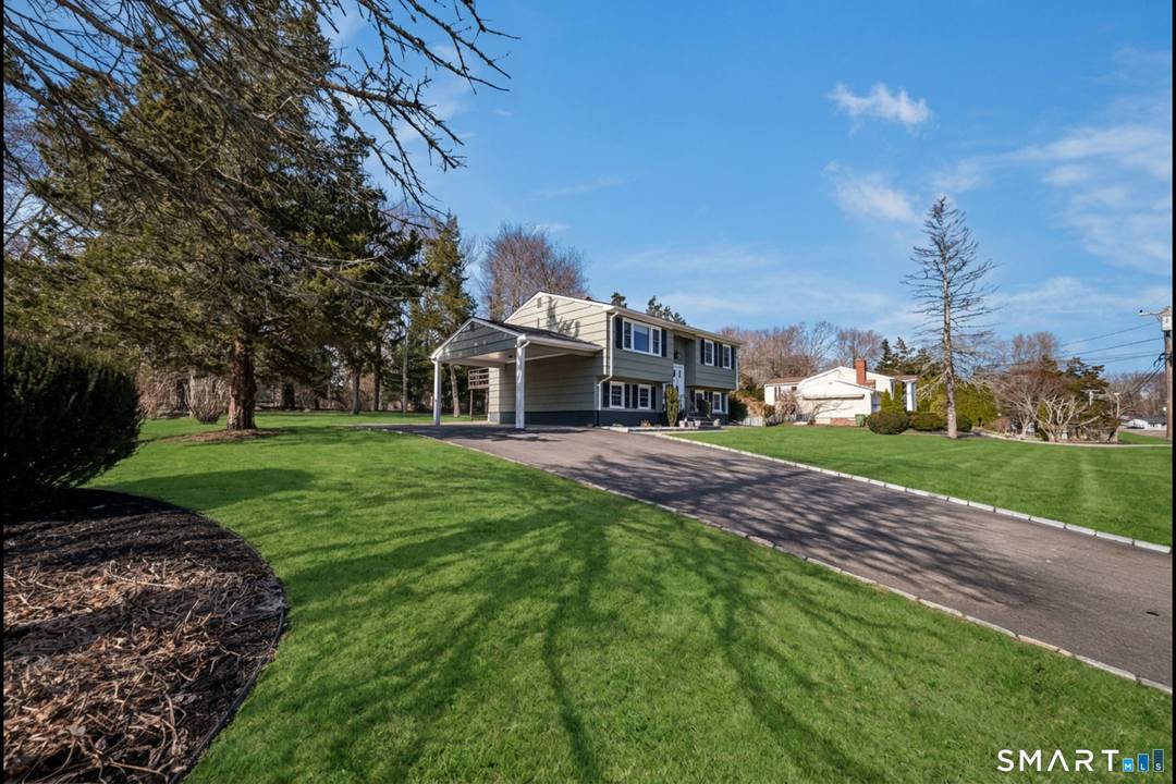 Welcome to this beautifully maintained 4 bedroom, 2 full bath raised ranch set on a generous.