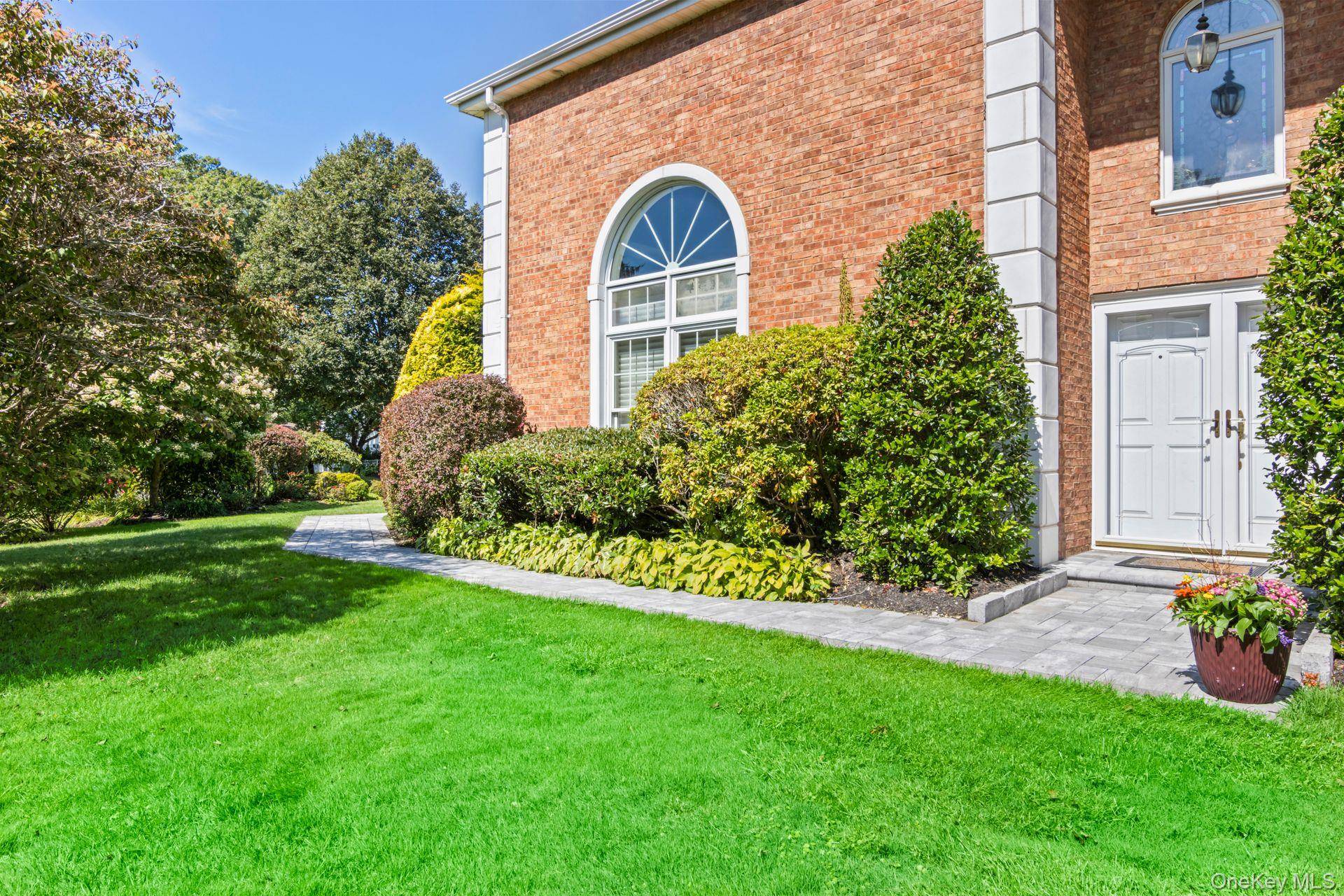 Welcome to luxury living in the prestigious, gated community of The Hamlet Golf and Country Club of Commack.